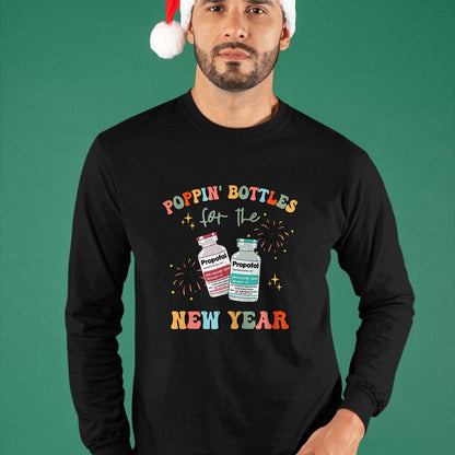 Funny Nurse Shirt, Nurse Unisex T-Shirt/Hoodie/Sweatshirt HLT00 -ICU Nurse New Year Eve Outfit Poppin Bottles ER RN CNA Nurse T-Shirt