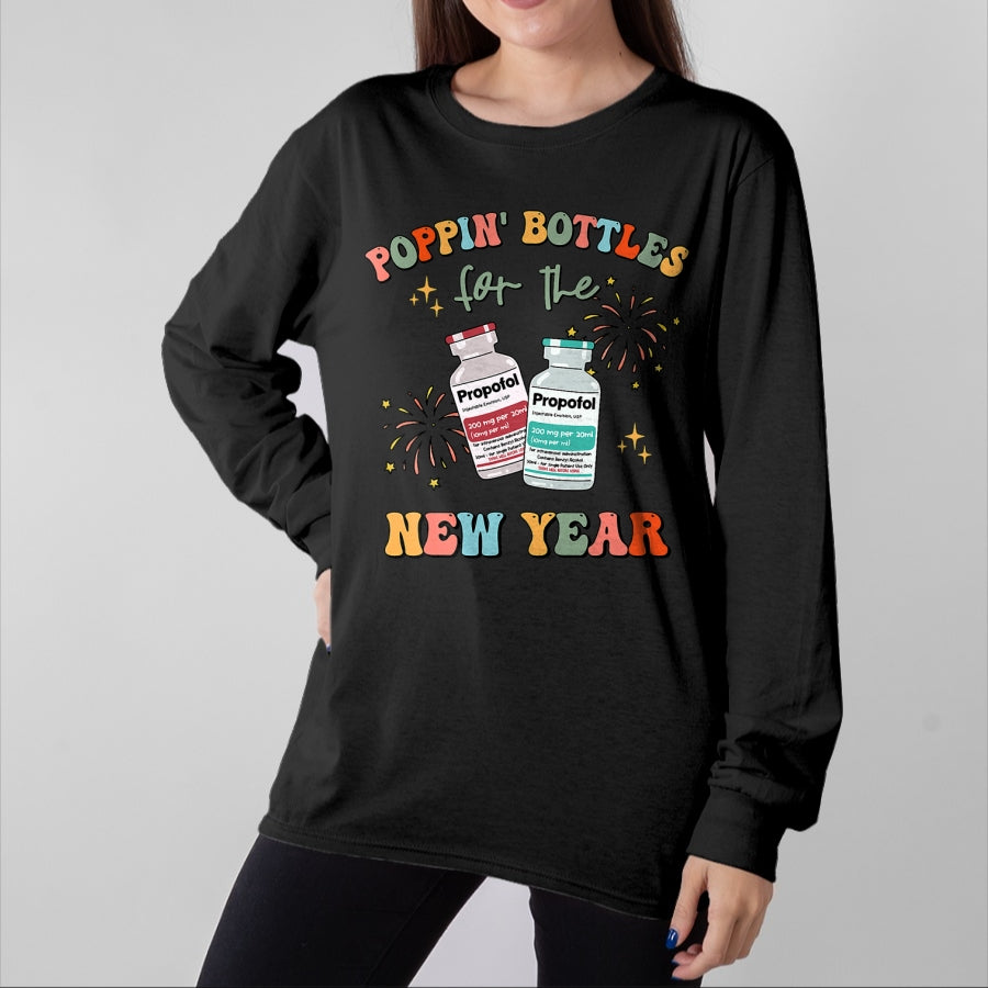 Funny Nurse Shirt, Nurse Unisex T-Shirt/Hoodie/Sweatshirt HLT00 -ICU Nurse New Year Eve Outfit Poppin Bottles ER RN CNA Nurse T-Shirt